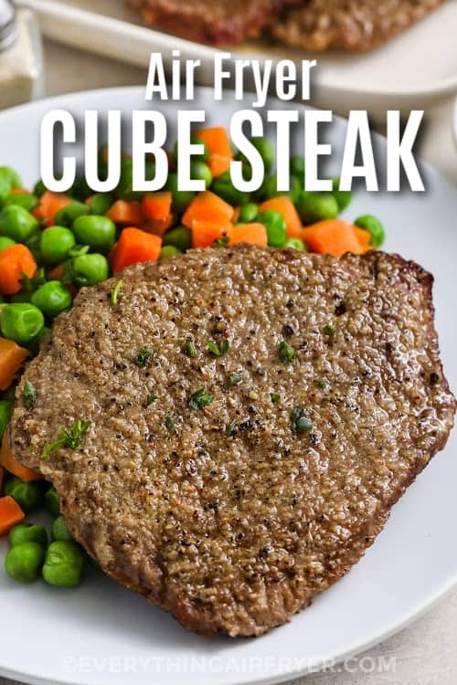 Air Fryer Cube Steak on a plate with veggies with text