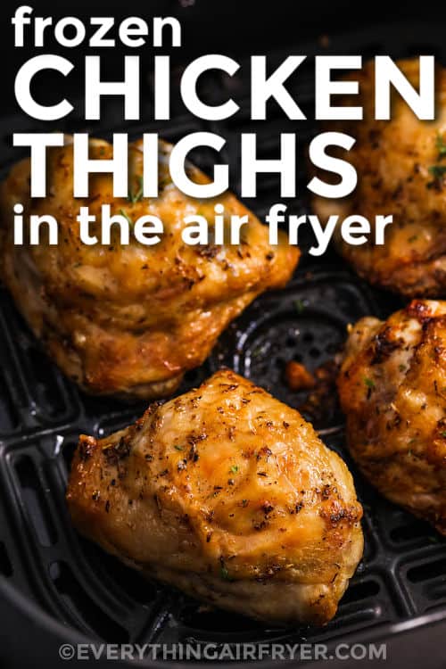 close up of Frozen Chicken Thighs in Air Fryer cooked in the fryer with a title